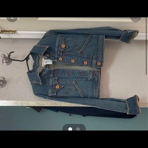 Women’s jean jacket. Medium crop cut